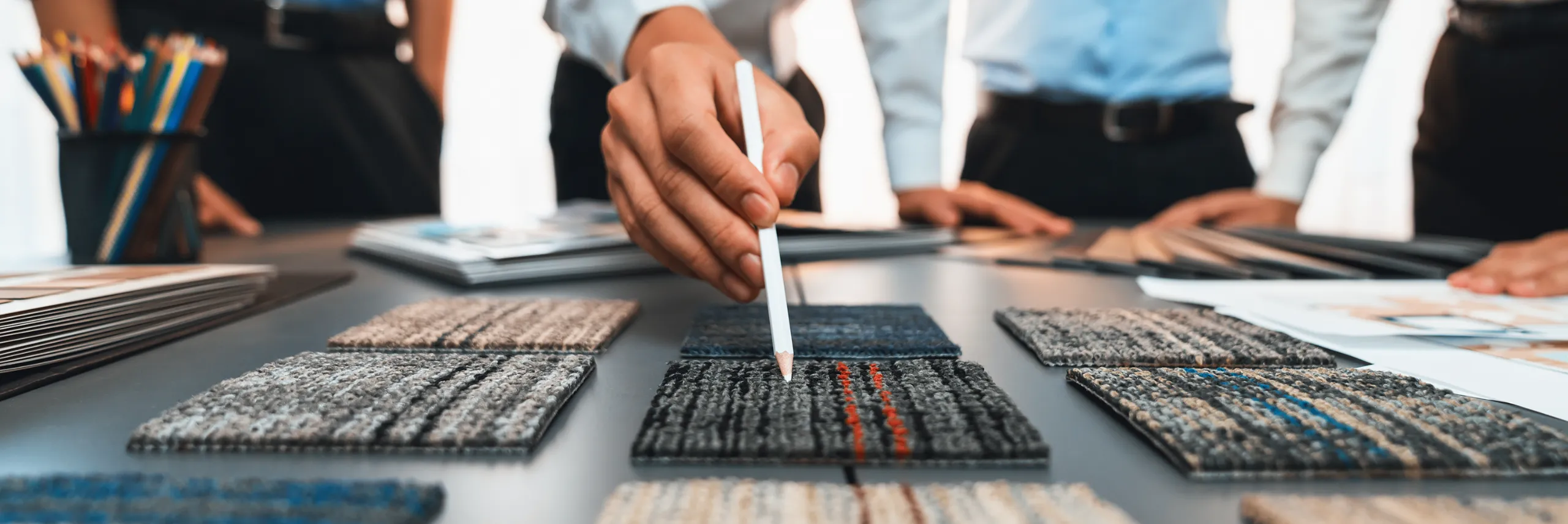 Commercial designer reviewing flooring samples